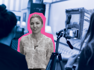 Attendee of the Women Executive Leadership Conference being interviewed