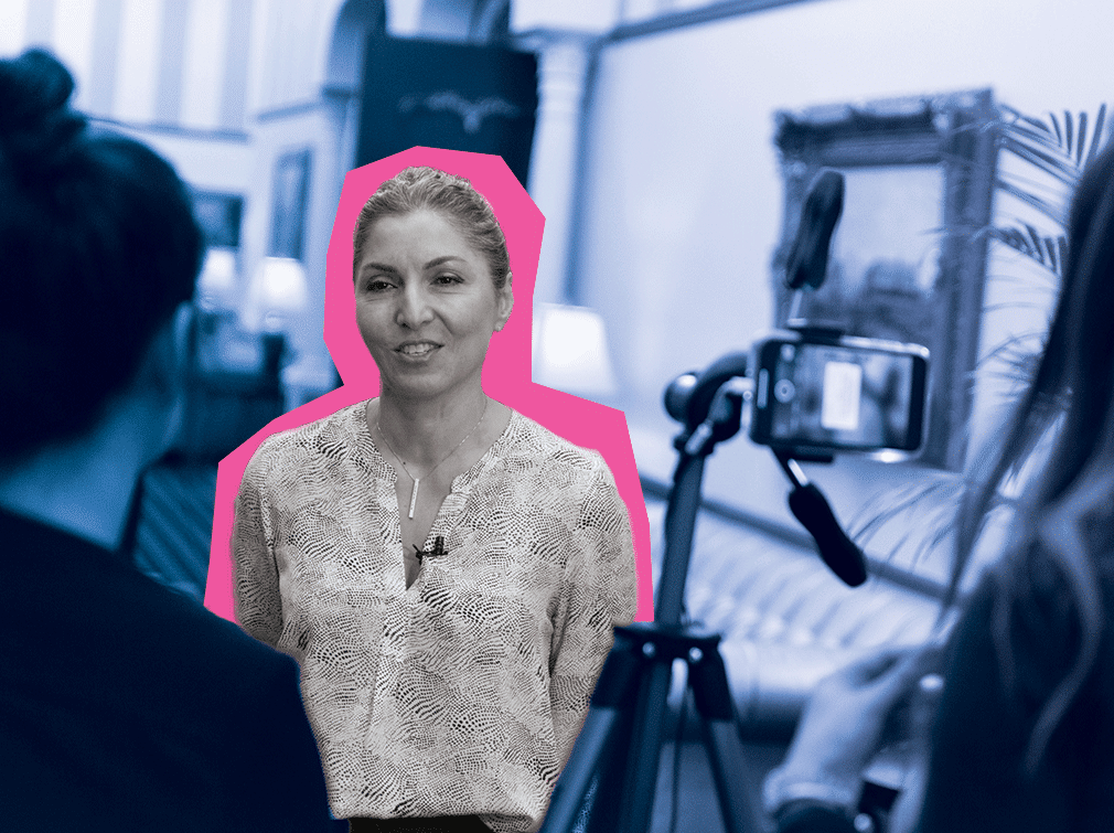 Attendee of the Women Executive Leadership Conference being interviewed